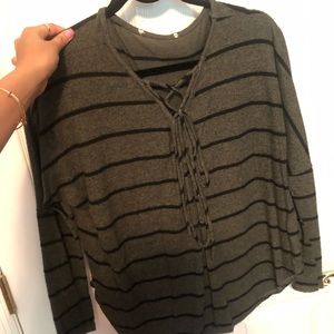 Green and black striped long sleeve top